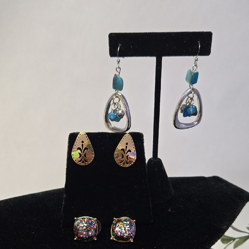 Three Pairs Goldtone And Silvertone Earrings